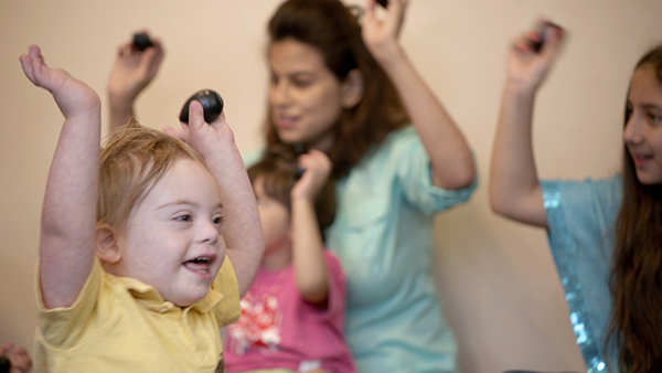 boy with special needs enjoying mixed-age class